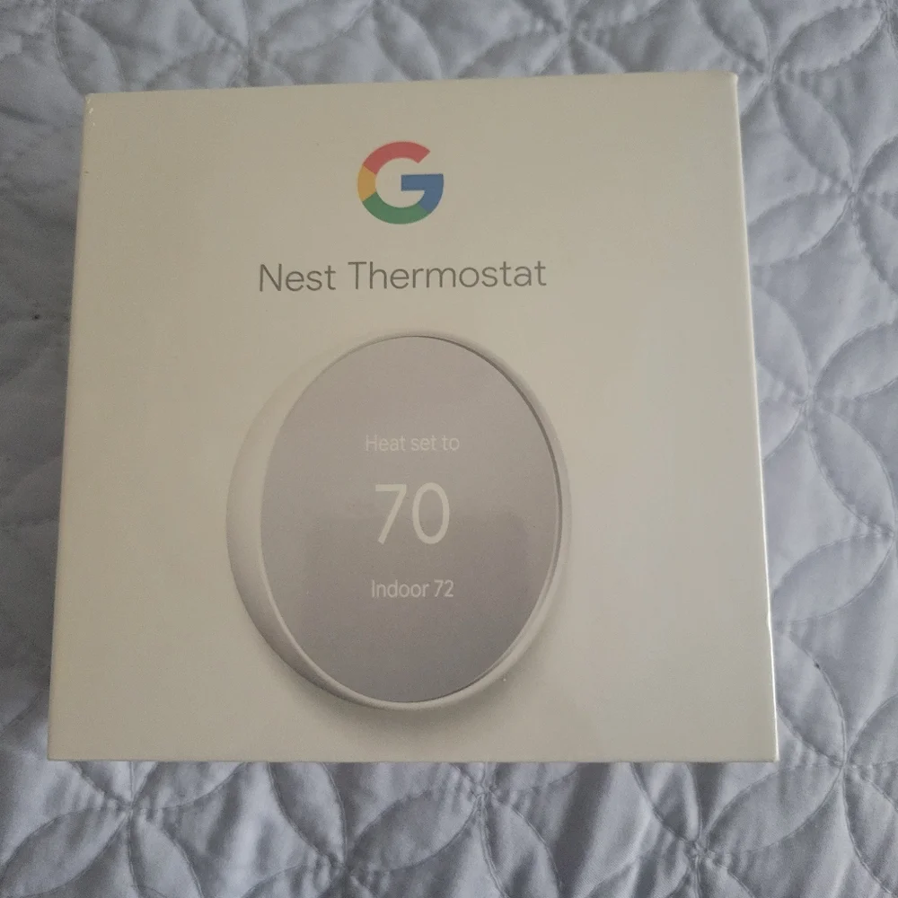 Google Nest Thermostat - Sleek White Design